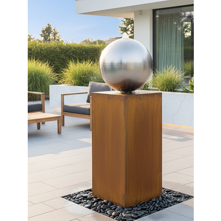 Moderner Terrassenbrunnen aus Cortenstahl mit integrierter Quellkugel. Witterungsbeständig, winterfest und pflegeleicht – ideal für Garten & Terrasse